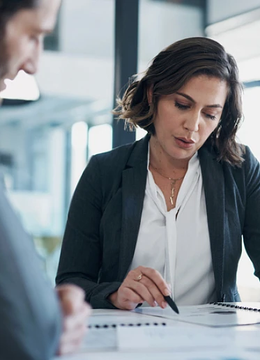 woman looking
                                                through cover letter